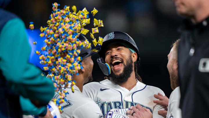 Apr 11, 2026; Seattle, Washington, USA; Seattle Mariners shortstop J.P. Crawford (3) celebrates with teammates after a game against the Houston Astros at T-Mobile Park. Mandatory Credit: Stephen Brashear-Imagn Images