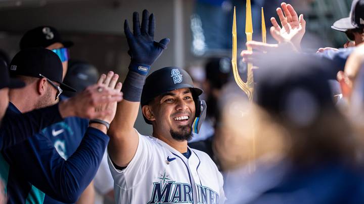 May 20, 2026; Seattle, Washington, USA; Seattle Mariners catcher Jhonny Pereda (5) celebrates in the dugout after hitting a solo home run during the seventh inning against the Chicago White Sox at T-Mobile Park. Mandatory Credit: Stephen Brashear-Imagn Images