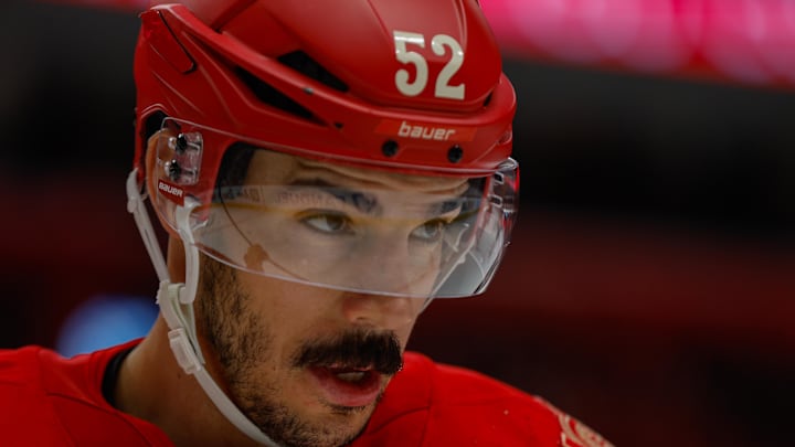 Nov 9, 2025; Detroit, Michigan, USA; Detroit Red Wings defenseman Travis Hamonic (52) looks on during the third period against the Chicago Blackhawks at Little Caesars Arena. Mandatory Credit: Brian Bradshaw Sevald-Imagn Images