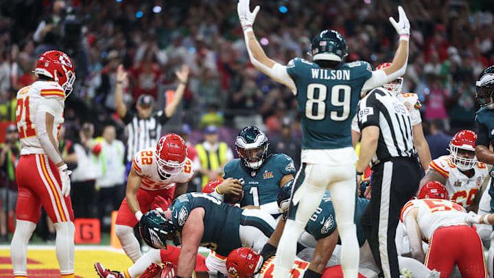 Feb 9, 2025; New Orleans, LA, USA; Philadelphia Eagles quarterback Jalen Hurts (1) scores a touchdown against the Kansas City Chiefs in the first quarter in Super Bowl LIX at Ceasars Superdome. Mandatory Credit: Mark J. Rebilas-Imagn Images