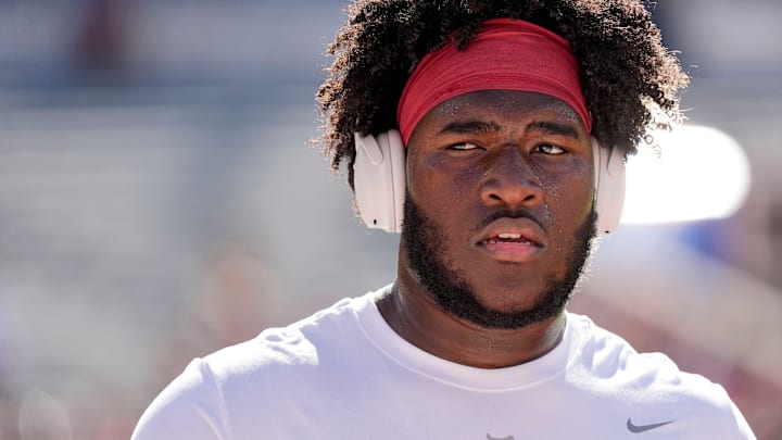 Nov 16, 2024; Tuscaloosa, AL, USA; Alabama Crimson Tide offensive lineman Tyler Booker (52) warms up before the game with the Mercer Bears at Bryant-Denny Stadium. Mandatory Credit: Gary Cosby Jr.-Tuscaloosa News Nov 16, 2024; Tuscaloosa, AL, USA; Alabama Crimson Tide offensive lineman Tyler Booker (52) warms up before the game with the Mercer Bears at Bryant-Denny Stadium. Mandatory Credit: Gary Cosby Jr.-Tuscaloosa News