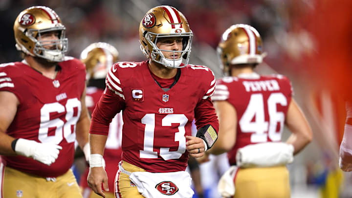 Dec 12, 2024; Santa Clara, California, USA; San Francisco 49ers quarterback Brock Purdy (13) walks towards the sidelines after throwing an incomplete pass against the Los Angeles Rams in the first quarter at Levi's Stadium. Mandatory Credit: Cary Edmondson-Imagn Images Dec 12, 2024; Santa Clara, California, USA; San Francisco 49ers quarterback Brock Purdy (13) walks towards the sidelines after throwing an incomplete pass against the Los Angeles Rams in the first quarter at Levi's Stadium. Mandatory Credit: Cary Edmondson-Imagn Images