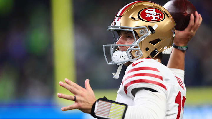Jan 17, 2026; Seattle, WA, USA; San Francisco 49ers quarterback Brock Purdy (13) warms up before the start of the second half against the Seattle Seahawks in an NFC Divisional Round game at Lumen Field. Mandatory Credit: Kevin Ng-Imagn Images