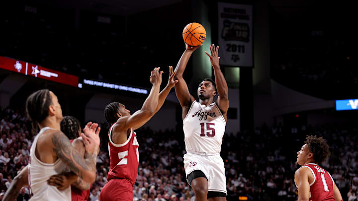 Jan 11, 2025; College Station, Texas, USA; Texas A&M Aggies forward Henry Coleman III (15) shoots inside against the Alabama Crimson Tide during the first half at Reed Arena. Mandatory Credit: Erik Williams-Imagn Images