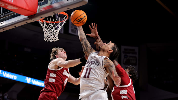 Jan 11, 2025; College Station, Texas, USA; Texas A&M Aggies forward Andersson Garcia (11) rebounds against the Alabama Crimson Tide during the second half at Reed Arena. Mandatory Credit: Erik Williams-Imagn Images