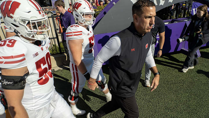 Oct 19, 2024; Evanston, Illinois, USA; Wisconsin Badgers head coach Luke Fickell leads his team onto the field before a game against the Northwestern Wildcats at Lanny and Sharon Martin Stadium. Wisconsin won 23-3.