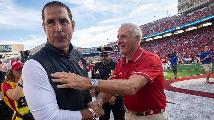 Wisconsin head coach Luke Fickell, left, is is greeted by Milwaukee businessman and philanthropist Ted Kellner. Wisconsin head coach Luke Fickell, left, is is greeted by Milwaukee businessman and philanthropist Ted Kellner.