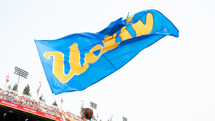 Sep 25, 2021; Stanford, California, USA; UCLA Bruins flag flies during the second quarter against the Stanford Cardinal at Stanford Stadium. Mandatory Credit: Stan Szeto-Imagn Images Sep 25, 2021; Stanford, California, USA; UCLA Bruins flag flies during the second quarter against the Stanford Cardinal at Stanford Stadium. Mandatory Credit: Stan Szeto-Imagn Images