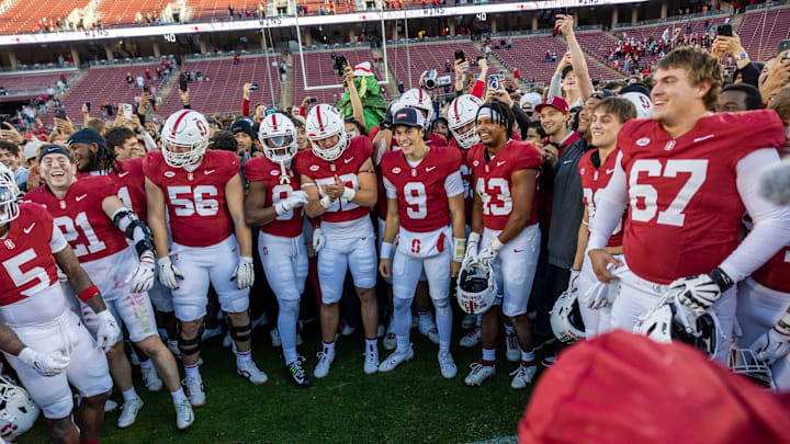 Nov 16, 2024; Stanford, California, USA;  Stanford celebrates their win against the Louisville Cardinals at Stanford Stadium. Mandatory Credit: Bob Kupbens-Imagn Images