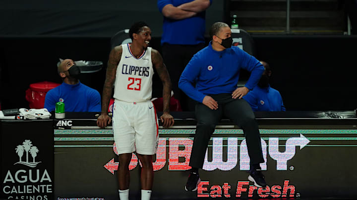 Feb 15, 2021; Los Angeles, California, USA; LA Clippers coach Tyronn Lue and guard Lou Williams (23) react in the final minute of the game against the Miami Heat at Staples Center. The Clippers defeated the Heat 125-118. Mandatory Credit: Kirby Lee-Imagn Images Feb 15, 2021; Los Angeles, California, USA; LA Clippers coach Tyronn Lue and guard Lou Williams (23) react in the final minute of the game against the Miami Heat at Staples Center. The Clippers defeated the Heat 125-118. Mandatory Credit: Kirby Lee-Imagn Images