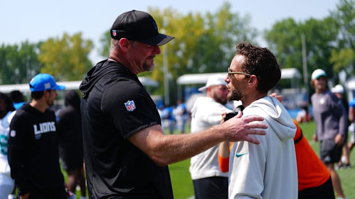 Detroit Lions coach Dan Campbell shakes hands with Miami Dolphins coach Mike McDaniels after a joint practice at Lions headquarters and training facility in Allen Park, Thursday, Aug. 14, 2025.