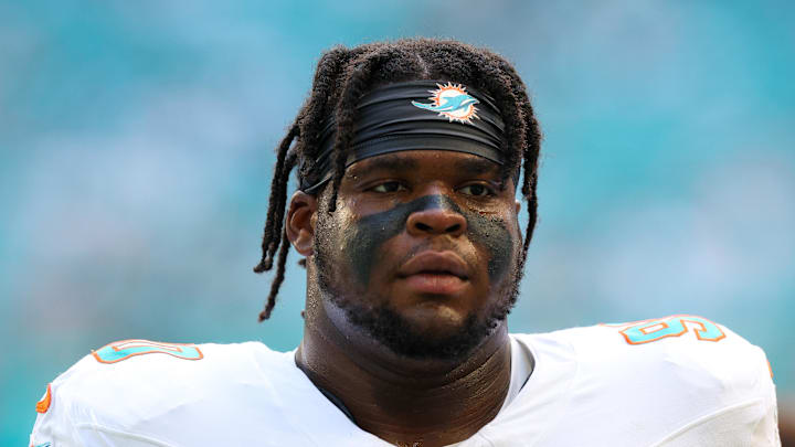 Miami Dolphins defensive tackle Kenneth Grant (90) looks on before a game against the New England Patriots at Hard Rock Stadium. Miami Dolphins defensive tackle Kenneth Grant (90) looks on before a game against the New England Patriots at Hard Rock Stadium.