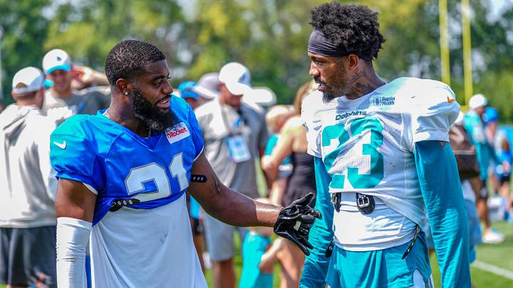 Detroit Lions CB Amik Robertson (21) talks with Miami Dolphins CB Jack Jones (23) at the end of the joint practice with the Miami Dolphins at the Lions headquarters and training facility in Allen Park, Thursday, Aug. 14 2025 Detroit Lions CB Amik Robertson (21) talks with Miami Dolphins CB Jack Jones (23) at the end of the joint practice with the Miami Dolphins at the Lions headquarters and training facility in Allen Park, Thursday, Aug. 14 2025
