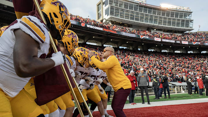 Nov 29, 2024; Madison, Wisconsin, USA; Minnesota head coach P.J. Fleck is shown with his team before their game at Camp Randall Stadium. Mandatory Credit: Mark Hoffman/USA TODAY Network via Imagn Images Nov 29, 2024; Madison, Wisconsin, USA; Minnesota head coach P.J. Fleck is shown with his team before their game at Camp Randall Stadium. Mandatory Credit: Mark Hoffman/USA TODAY Network via Imagn Images