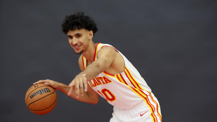 Jun 28, 2024; Atlanta, Georgia, USA; Atlanta Hawks first overall draft pick Zaccharie Risacher (10) poses for a photo at the Emory Sports Medicine Complex. Mandatory Credit: Brett Davis-USA TODAY Sports
