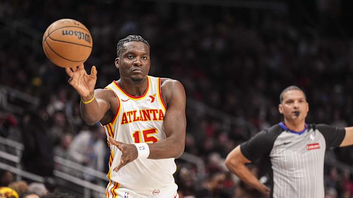 Jan 25, 2025; Atlanta, Georgia, USA; Atlanta Hawks center Clint Capela (15) inbounds the ball against the Toronto Raptors during the first half at State Farm Arena. Mandatory Credit: Dale Zanine-Imagn Images
