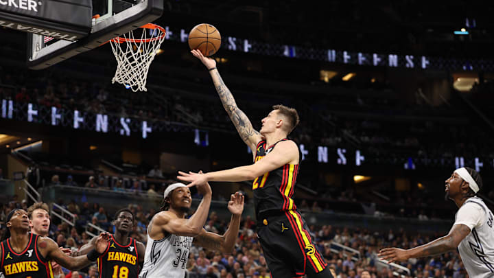 Feb 10, 2025; Orlando, Florida, USA; Atlanta Hawks guard Vit Krejci (27) drives to the basket against the Orlando Magic in the second quarter at Kia Center. Mandatory Credit: Nathan Ray Seebeck-Imagn Images