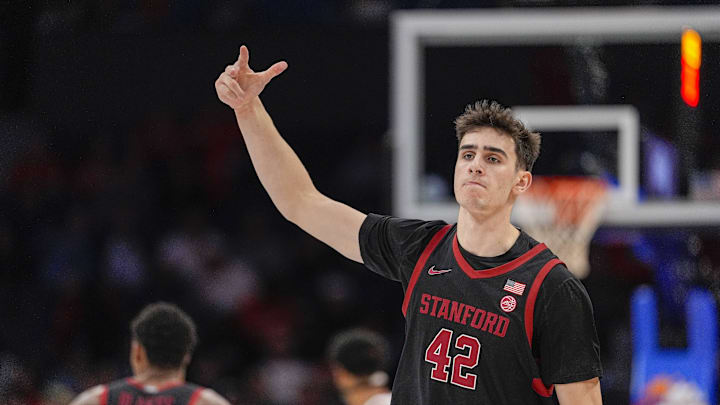 Mar 13, 2025; Charlotte, NC, USA; Stanford Cardinal forward Maxime Raynaud (42) after a dunk against the Louisville Cardinals during the second half at Spectrum Center. Mandatory Credit: Jim Dedmon-Imagn Images