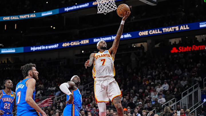 Oct 25, 2025; Atlanta, Georgia, USA; Atlanta Hawks guard Nickeil Alexander-Walker (7) drives to the basket against the Oklahoma City Thunder during the first half at State Farm Arena. Mandatory Credit: Dale Zanine-Imagn Images Oct 25, 2025; Atlanta, Georgia, USA; Atlanta Hawks guard Nickeil Alexander-Walker (7) drives to the basket against the Oklahoma City Thunder during the first half at State Farm Arena. Mandatory Credit: Dale Zanine-Imagn Images