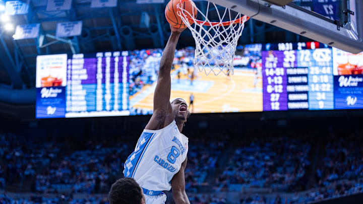 Dec 22, 2025; Chapel Hill, North Carolina, USA; North Carolina Tar Heels forward Caleb Wilson (8) attempts a dunk during the second half against the East Carolina Pirates at Dean E. Smith Center. Mandatory Credit: Scott Kinser-Imagn Images