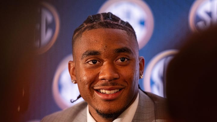 Arkansas Razorbacks quarterback Taylen Green speaking at Omni Dallas Hotel at the 2024 SEC Football Kickoff in Dallas.