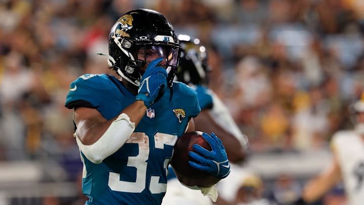 Jacksonville Jaguars running back Bhayshul Tuten (33) reacts to his touchdown score during the fourth quarter of an NFL preseason matchup at EverBank Stadium, Saturday, Aug. 9, 2025 in Jacksonville, Fla. The Steelers defeated the Jaguars 31-25. [Corey Perrine/Florida Times-Union]