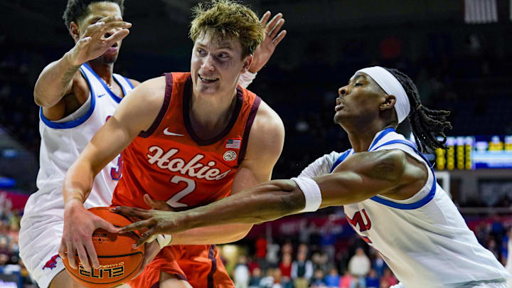 Jan 14, 2026; Dallas, Texas; Virginia Tech guard Jaden Schutt (2) is double teamed by SMU forward Corey Washington (3) and guard Jaron Pierre Jr. (5).