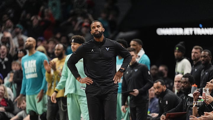 Feb 7, 2025; Charlotte, North Carolina, USA; Charlotte Hornets head coach Charles Lee reacts to a play during the second half against the San Antonio Spurs at Spectrum Center. Mandatory Credit: Jim Dedmon-Imagn Images