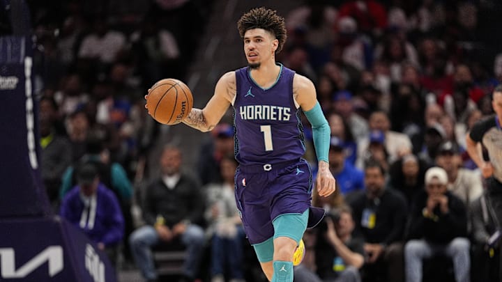 Mar 20, 2025; Charlotte, North Carolina, USA; Charlotte Hornets guard LaMelo Ball (1) brings the ball up court against the New York Knicks during the second half at Spectrum Center. Mandatory Credit: Jim Dedmon-Imagn Images