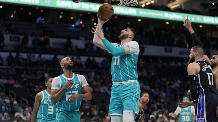Apr 4, 2025; Charlotte, North Carolina, USA; Charlotte Hornets center Jusuf Nurkic (11) goes to the basket against the Sacramento Kings during the second half at Spectrum Center. Mandatory Credit: Jim Dedmon-Imagn Images