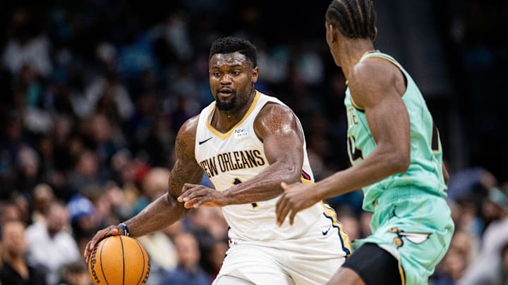 Jan 25, 2025; Charlotte, North Carolina, USA; New Orleans Pelicans forward Zion Williamson (1) brings the ball up court against the Charlotte Hornets at Spectrum Center. Mandatory Credit: Scott Kinser-Imagn Images