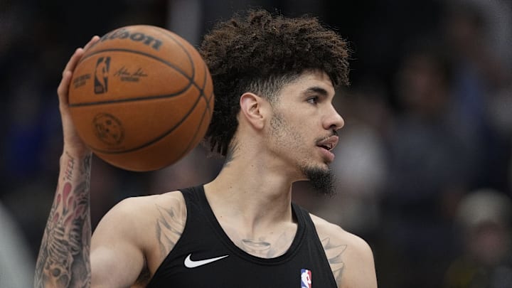 Mar 3, 2025; Charlotte, North Carolina, USA; Charlotte Hornets guard LaMelo Ball (1) during pregame warm ups against the Golden State Warriors at Spectrum Center. Mandatory Credit: Jim Dedmon-Imagn Images