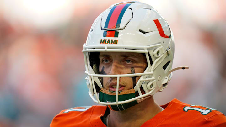 Nov 8, 2025; Miami Gardens, Florida, USA; Miami Hurricanes quarterback Carson Beck (11) looks to the bench in a game against the Syracuse Orange during the first quarter at Hard Rock Stadium. Mandatory Credit: Jeff Romance-Imagn Images