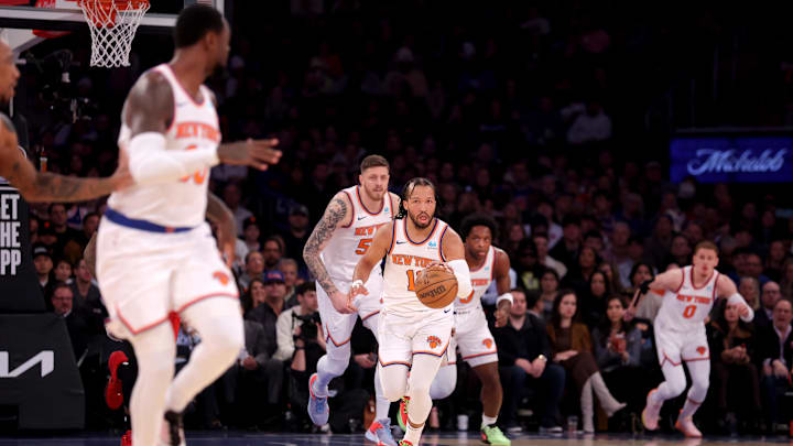Jan 3, 2024; New York, New York, USA; New York Knicks guard Jalen Brunson (11) brings the ball up court against the Chicago Bulls with forward Julius Randle (30) and center Isaiah Hartenstein (55) and forward OG Anunoby (8) and guard Donte DiVincenzo (0) during the first quarter at Madison Square Garden. Mandatory Credit: Brad Penner-Imagn Images