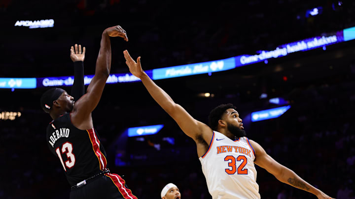 Oct 30, 2024; Miami, Florida, USA; Miami Heat center Bam Adebayo (13) shoots the basketball over New York Knicks center Karl-Anthony Towns (32) during the first quarter at Kaseya Center. Mandatory Credit: Sam Navarro-Imagn Images Oct 30, 2024; Miami, Florida, USA; Miami Heat center Bam Adebayo (13) shoots the basketball over New York Knicks center Karl-Anthony Towns (32) during the first quarter at Kaseya Center. Mandatory Credit: Sam Navarro-Imagn Images