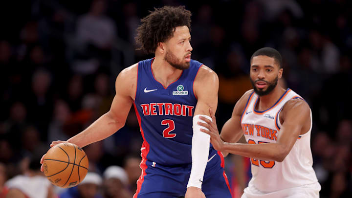 Jan 13, 2025; New York, New York, USA; Detroit Pistons guard Cade Cunningham (2) controls the ball against New York Knicks forward Mikal Bridges (25) during the second quarter at Madison Square Garden. Mandatory Credit: Brad Penner-Imagn Images