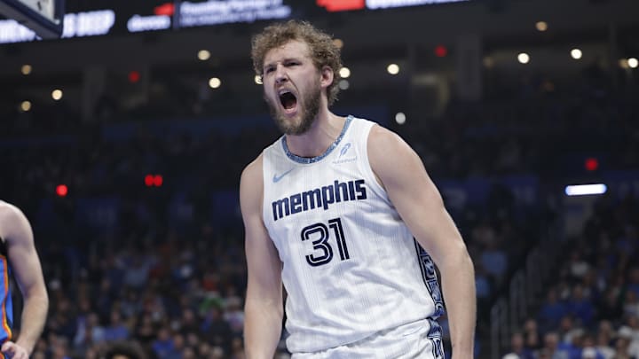 Dec 22, 2025; Oklahoma City, Oklahoma, USA; Memphis Grizzlies center Jock Landale (31) screams after dunking against the Oklahoma City Thunder during the first quarter at Paycom Center. Mandatory Credit: Alonzo Adams-Imagn Images