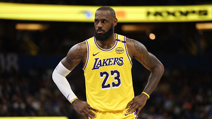 Mar 24, 2025; Orlando, Florida, USA; Los Angeles Lakers forward LeBron James (23) looks on against the Orlando Magic in the second quarter at Kia Center. Mandatory Credit: Nathan Ray Seebeck-Imagn Images Mar 24, 2025; Orlando, Florida, USA; Los Angeles Lakers forward LeBron James (23) looks on against the Orlando Magic in the second quarter at Kia Center. Mandatory Credit: Nathan Ray Seebeck-Imagn Images