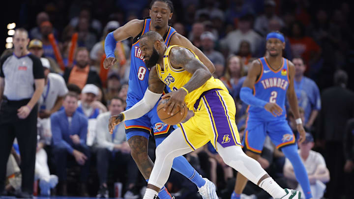 Apr 8, 2025; Oklahoma City, Oklahoma, USA; Los Angeles Lakers forward LeBron James (23) drives against Oklahoma City Thunder forward Jalen Williams (8) during the second half at Paycom Center. Mandatory Credit: Alonzo Adams-Imagn Images Apr 8, 2025; Oklahoma City, Oklahoma, USA; Los Angeles Lakers forward LeBron James (23) drives against Oklahoma City Thunder forward Jalen Williams (8) during the second half at Paycom Center. Mandatory Credit: Alonzo Adams-Imagn Images