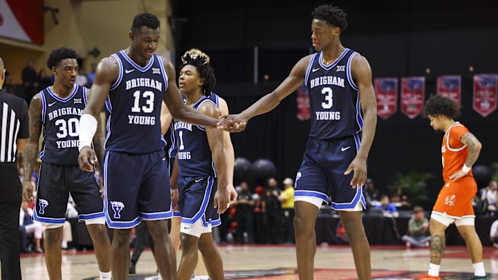 Nov 27, 2025; Kissimmee, Florida, USA; Brigham Young University Cougars center Keba Keita (13) and forward AJ Dybantsa (3) react after a called foul against the Miami (FL) Hurricanes in the second half at State Farm Field House. Mandatory Credit: Nathan Ray Seebeck-Imagn Images Nov 27, 2025; Kissimmee, Florida, USA; Brigham Young University Cougars center Keba Keita (13) and forward AJ Dybantsa (3) react after a called foul against the Miami (FL) Hurricanes in the second half at State Farm Field House. Mandatory Credit: Nathan Ray Seebeck-Imagn Images