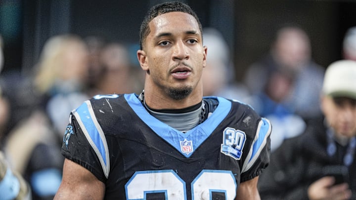 Dec 22, 2024; Charlotte, North Carolina, USA; Carolina Panthers running back Chuba Hubbard (30) after his game winning touchdown against the Arizona Cardinals during the second half at Bank of America Stadium. Mandatory Credit: Jim Dedmon-Imagn Images