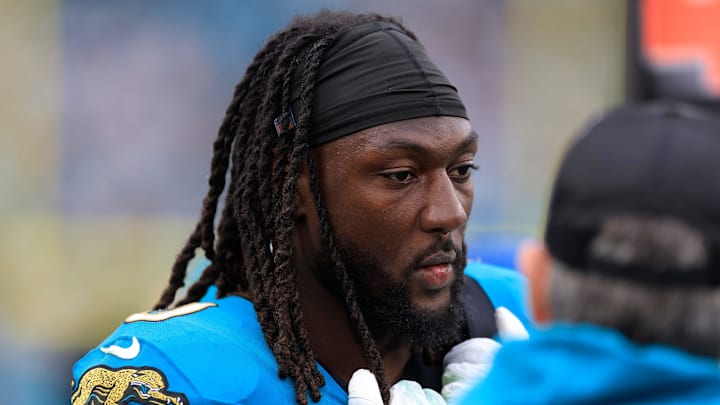 Jacksonville Jaguars linebacker Devin Lloyd (0) looks on from the sideline during the fourth quarter of an NFL football matchup Jacksonville Jaguars linebacker Devin Lloyd (0) looks on from the sideline during the fourth quarter of an NFL football matchup