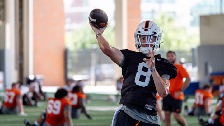 Maealiuaki Smith (8) warms up during an Oklahoma State football practice in Stillwater, Okla., on Wednesday, July 31, 2024.