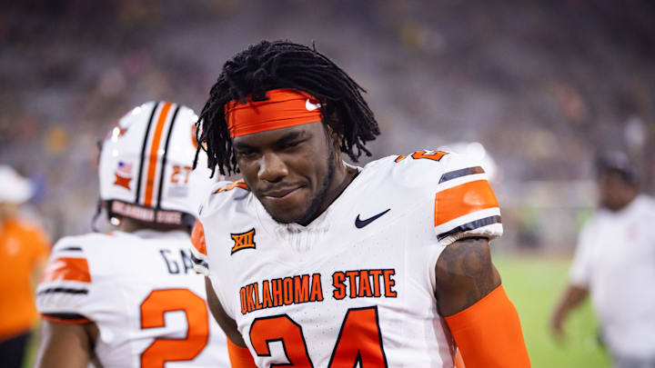 Sep 9, 2023; Tempe, Arizona, USA; Oklahoma State Cowboys cornerback De kelvion Beamon (24) against the Arizona State Sun Devils at Mountain America Stadium. Mandatory Credit: Mark J. Rebilas-Imagn Images