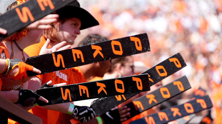 The Paddle people cheer in the first half of the college football game between the Oklahoma State Cowboys and the Baylor Bears at Boone Pickens Stadium in Stillwater, Okla., Saturday, Sept. 27, 2025.