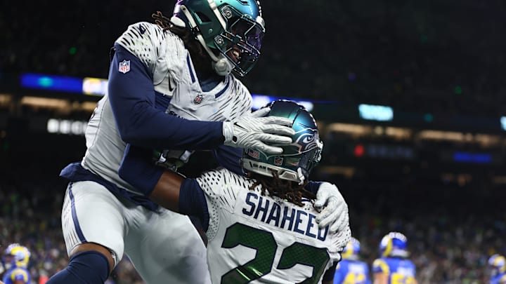 Dec 18, 2025; Seattle, Washington, USA; Seattle Seahawks wide receiver Rashid Shaheed (22) celebrates with fullback Brady Russell (38) after a touchdown against the Los Angeles Rams in the second half at Lumen Field. Mandatory Credit: Kevin Ng-Imagn Images