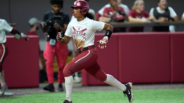 Oklahoma's Tia Malloy runs home to score a run during the OU softball Oklahoma Battle Series game at Love's Field in Norman, Okla., Wednesday, Oct. 2, 2024.