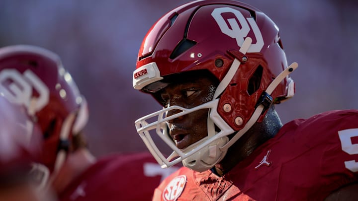 Oklahoma offensive lineman Michael Fasusi (56) warms up before the Sooners ' game vs. Michigan earlier this season. Fasusi said last week's loss to Texas would help make him a better player.