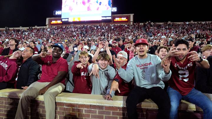 Fans celebrate during the final minutes a college football game between the University of Oklahoma Sooners (OU) and the Alabama Crimson Tide at Gaylord Family - Oklahoma Memorial Stadium in Norman, Okla., Saturday, Nov. 23, 2024. Oklahoma won 24-3. Fans celebrate during the final minutes a college football game between the University of Oklahoma Sooners (OU) and the Alabama Crimson Tide at Gaylord Family - Oklahoma Memorial Stadium in Norman, Okla., Saturday, Nov. 23, 2024. Oklahoma won 24-3.