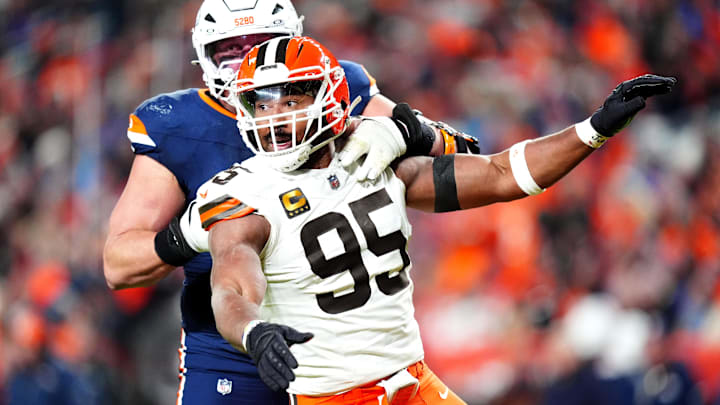 Dec 2, 2024; Denver, Colorado, USA; Denver Broncos offensive tackle Garett Bolles (72) and Cleveland Browns defensive end Myles Garrett (95) during the third quarter at Empower Field at Mile High. Mandatory Credit: Ron Chenoy-Imagn Images